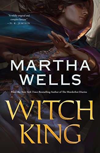 The front cover for the Witch King by Martha Wells. There is up close image of a person on the front with a blue cloak.