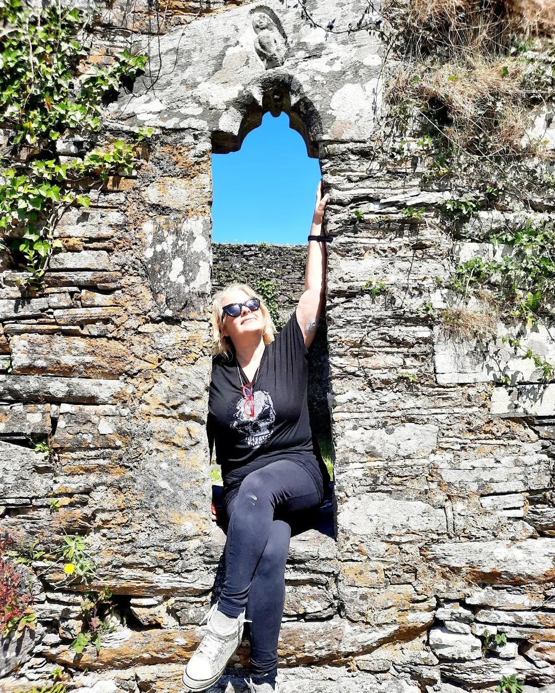 Tracy Fahey pictured mid-fieldwork in Ireland, at the St Gobnait sheela-na-gig