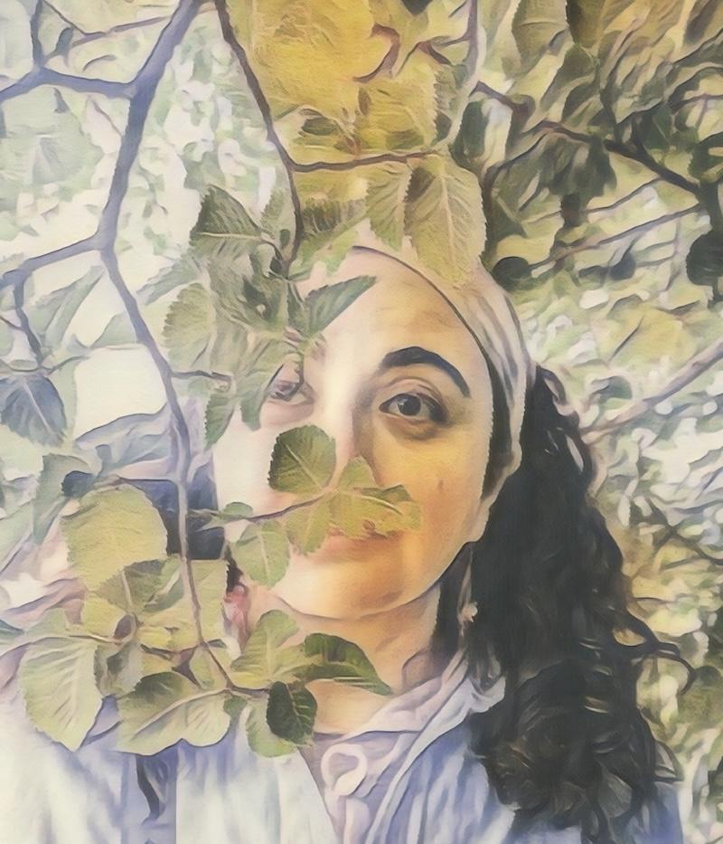 A heavily-treated image of author Nicki Pary surrounded by branches and leaves