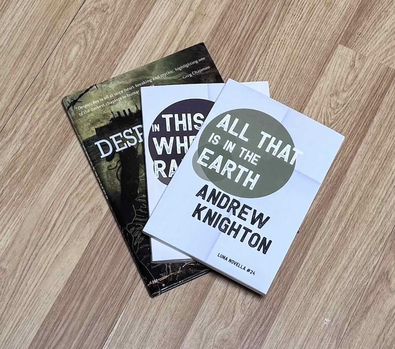 A selection of novellas, with All That is in the Earth by Andrew Knighton at the top