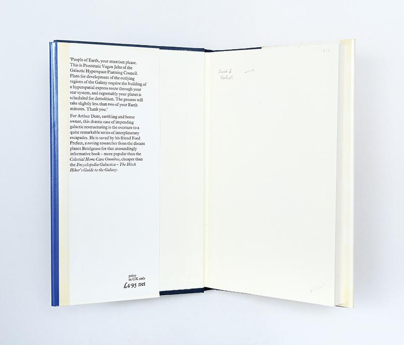 Inner dust jacket with blurb and price of £4.95 for  Douglas Adams' The Hitch-Hiker's Guide to the Galaxy
