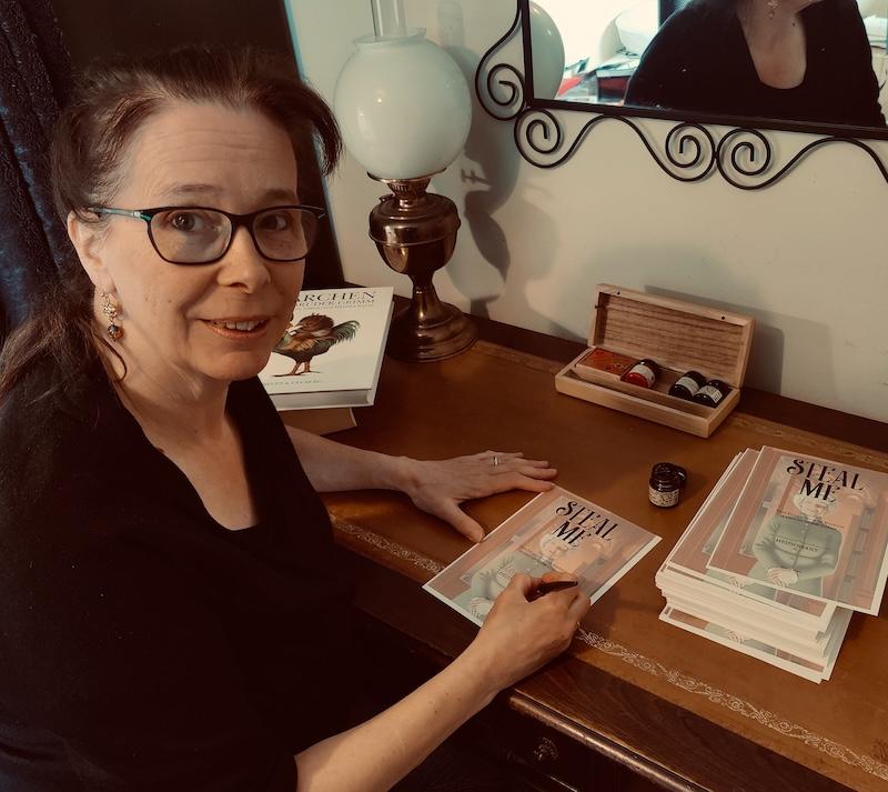 Author Helen Grant signs copies of her latest novella, Steal Me