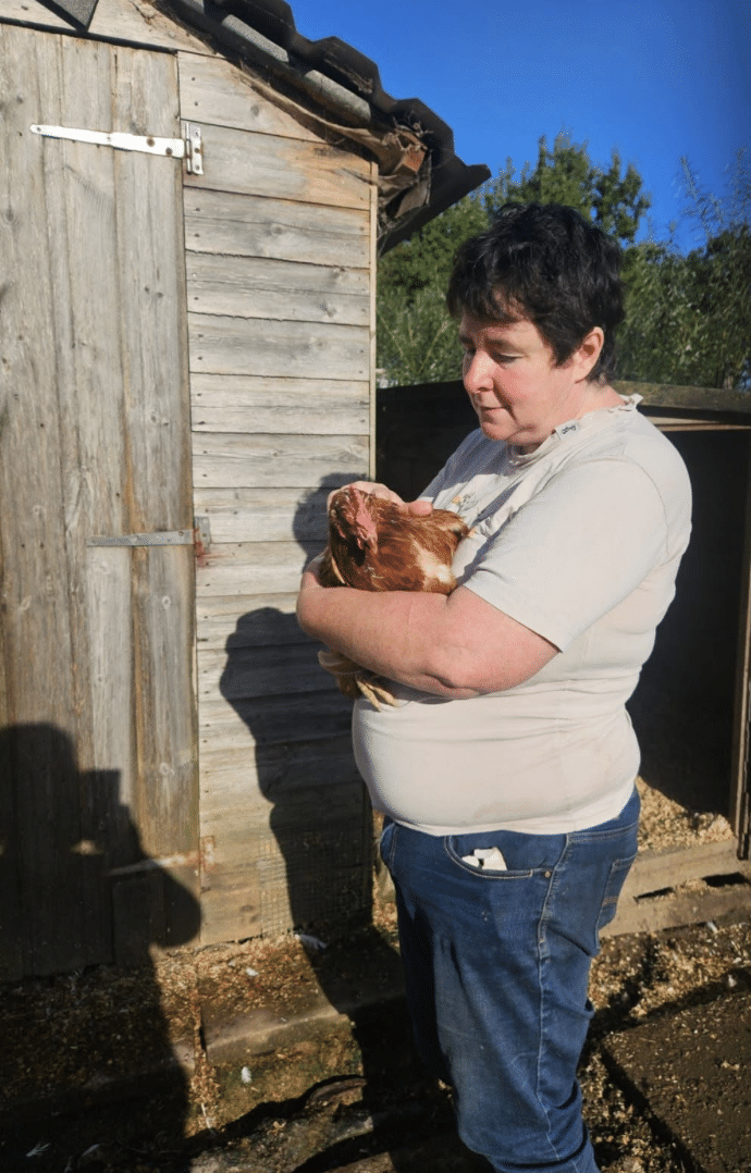 Joanne Hall with chicken friend